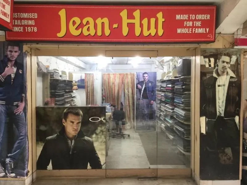 The Jean Hut shopfront on Lawrence Road, Amritsar, with its sign reading Customised tailoring since 1978, made to order for the whole family